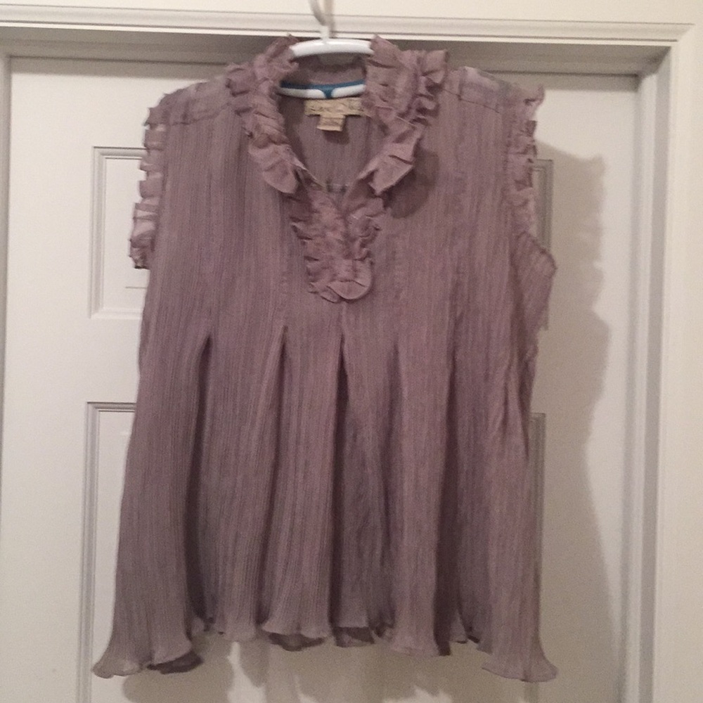 Dressy top. A little see thru. Frilly!